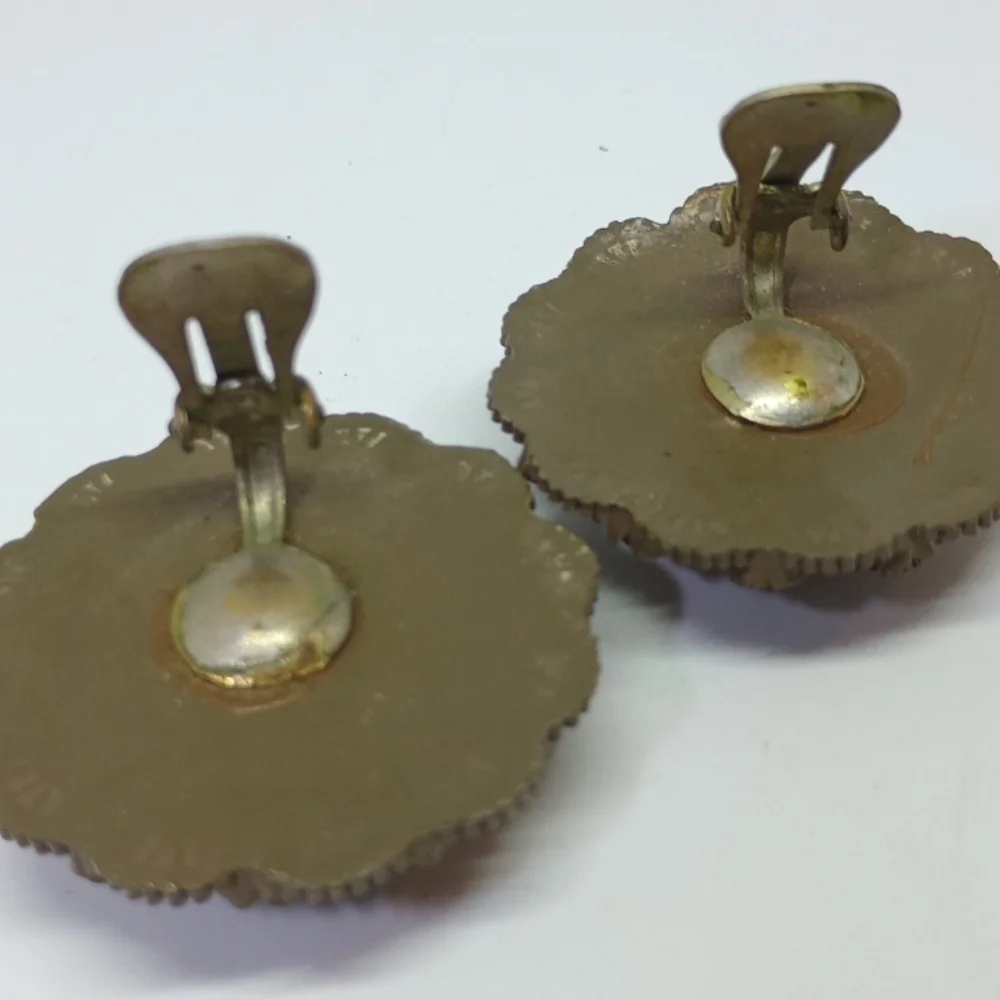 * vintage brown celluloid & moonglow clip on earrings